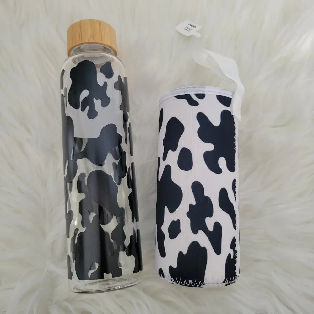Claire's Cow Print Glass Water Bottle with Sleeve